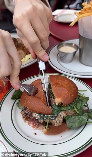 The eight-ounce burger is topped with au poivre sauce, emmental cheese and watercress tossed in a Dijon shallot vinaigrette.