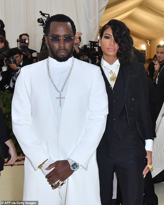 Diddy was hit with a series of lawsuits alleging sexual assault, rape and other crimes after he settled a similar lawsuit from his ex-girlfriend Cassie in November; Pictured with ex Cassie in 2018