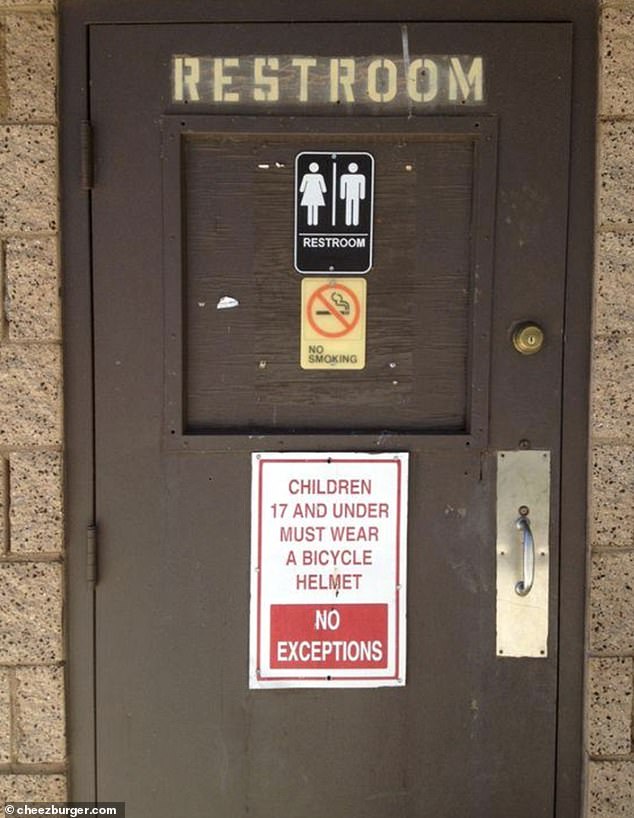 This strange sign, seen in a bathroom in the US, warned that children under 17 years of age must wear a helmet to use these facilities.