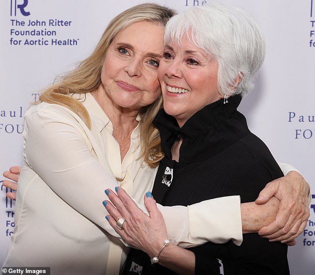 Thursday's beano also provided the opportunity for a red carpet reunion between John's former Three's Company co-stars, Joyce DeWitt (right), 75, and Priscilla Barnes (left), 69.