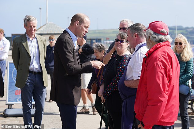 The Prince of Wales appeared in good spirits as he chatted with local businessmen during a visit to St. Mary's Harbour, the maritime gateway to the Isles of Scilly.