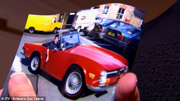 Trixy shows a snapshot of the vintage red car, a 1971 Triumph TR6, and Simon admits: 