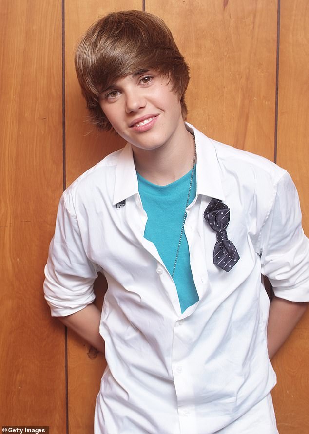 With his famously luscious locks in his youth, will Justin and Hailey's baby reclaim his father's iconic looks? (pictured in 2009)