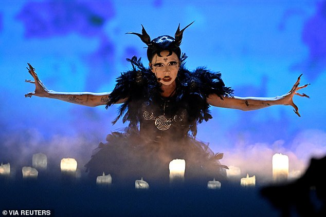 Bambie Thug, 31, a non-binary artist from County Cork, performed a spectacular performance of her song Doomsday Blue as they sang while performing a ritual surrounded by candles and were joined on stage by a dancer in demonic makeup and false teeth.