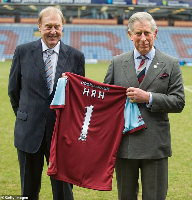 The King (pictured in 2010 with former Burnley boss Barry Kilby) is a Clarets fan and hopes Spurs do not condemn the team to relegation.