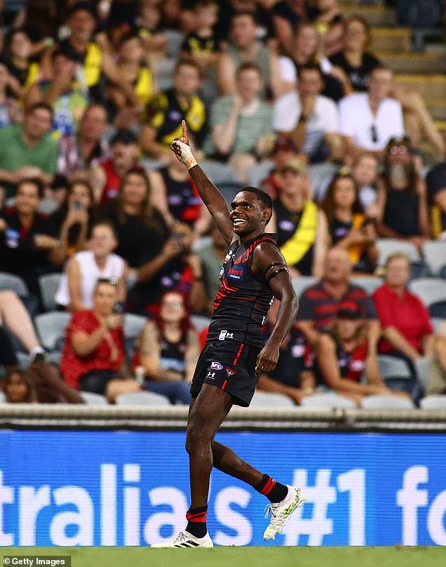 The Bombers' Irving Mosquito is shown celebrating after kicking his first goal on his debut in Darwin.