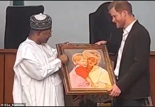 He was also presented with two paintings: one of him and his late mother, Princess Diana, and another of him and his wife Meghan.