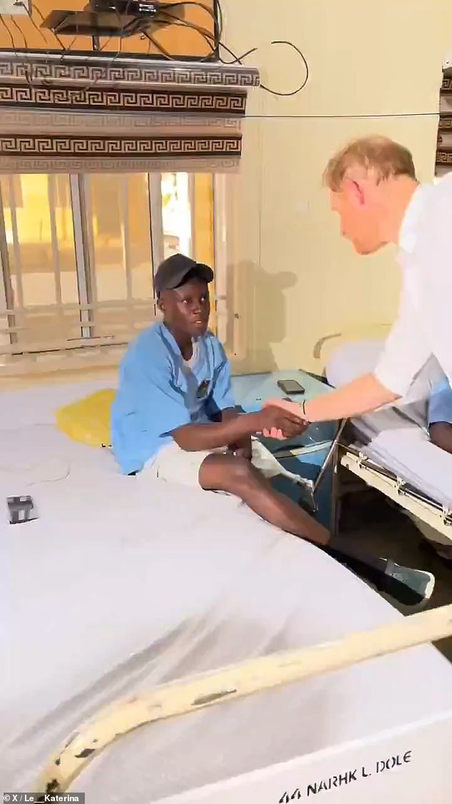 Harry shook hands with 50 wounded servicemen while visiting a military hospital in Kaduna.