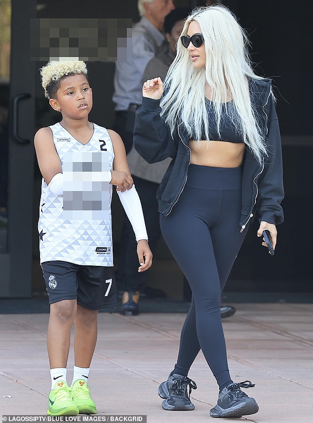 1715402288 728 Kim Kardashian matches her eight year old son Saints blonde hair as