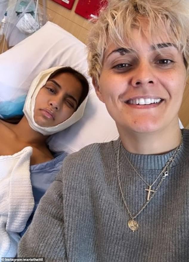 The beauty, 31, shared a photo of herself looking in pain as she lay in a hospital bed and told fans she was still recovering after having her wisdom teeth removed. Luckily, Maria's AFLW star girlfriend Moana Hope (right) was able to cheer her up by visiting her in hospital.