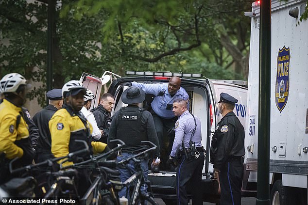 Police gather to clear protesters on the University of Pennsylvania campus in Philadelphia