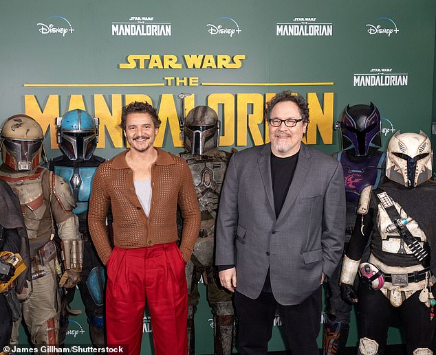 Directed by Jon Favreau and produced by Favreau along with Lucasfilm president Kathleen Kennedy and Dave Filoni, the new Star Wars film is expected to focus on the adventures of Din Djarin and Din Grogu; Star Pedro Pascal is seen with Favreau in February 2023.