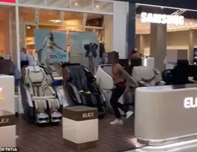 Terrifying footage has emerged of the moment a man accused students after school at a Westfield shopping center in Perth.