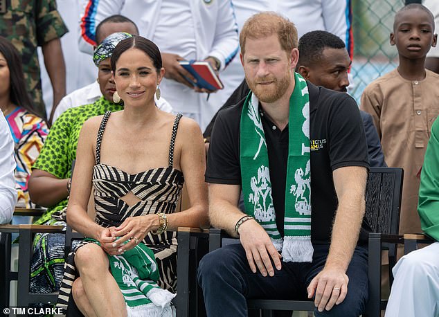 The couple looked focused as they watched the sitting volleyball exhibition match in the Nigerian capital.