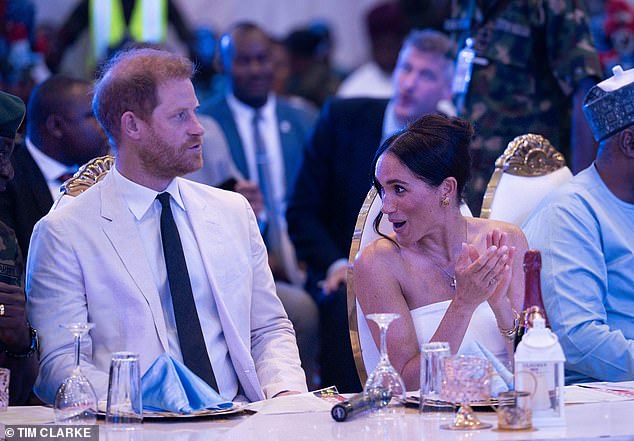 Prince Harry and his wife Meghan at a lunch with the Nigerian Defense Minister in Abuja