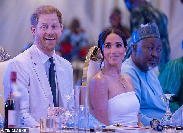 The couple appeared engaged as entertainment was provided to attendees.