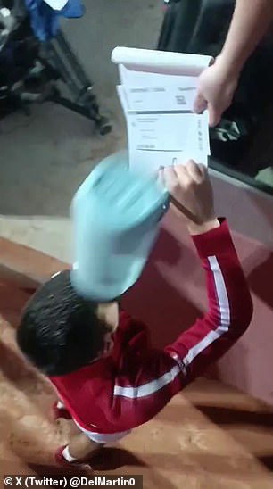 The world number one was hit with an object while signing autographs for his fans.