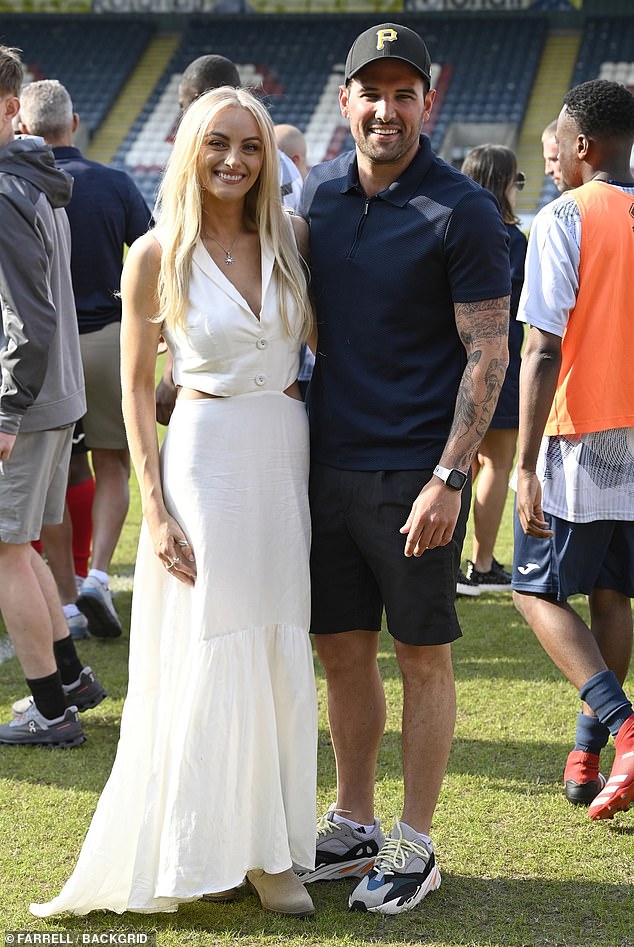 The Coronation Street favorite, 30, and the TOWIE star, 33, put on a very affectionate display during the event, as they stopped to pose beamingly.