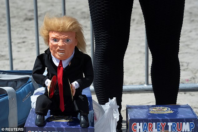 A Trump doll was on display on the boardwalk Saturday as supporters gathered to watch former President Donald Trump speak in Wildwood, New Jersey.