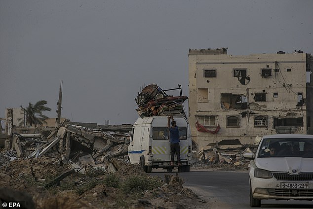 Internally displaced Palestinians arrive in Khan Younis after leaving Rafah following an evacuation order issued by the Israeli army.