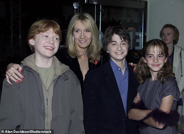 The author with the young cast of Harry Potter at the premiere of Harry Potter and the Philosopher's Stone