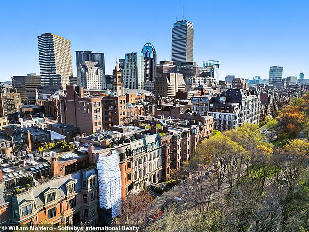 There are panoramic views of the city skyline from the roof of the house.