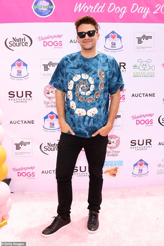 Tom Schwartz joined in the fun wearing a silly tie-dyed navy shirt with dog swirls on the front.