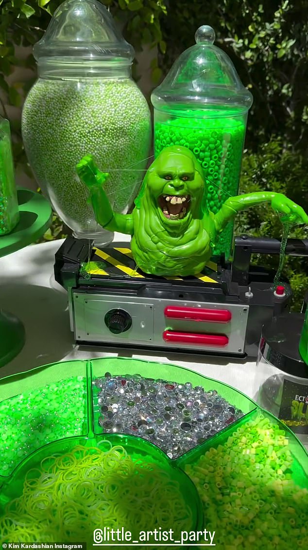 'Ok, Psalm's Ghostbusters party, how cute is this, is about to start,' Kim can be heard off-screen during the video