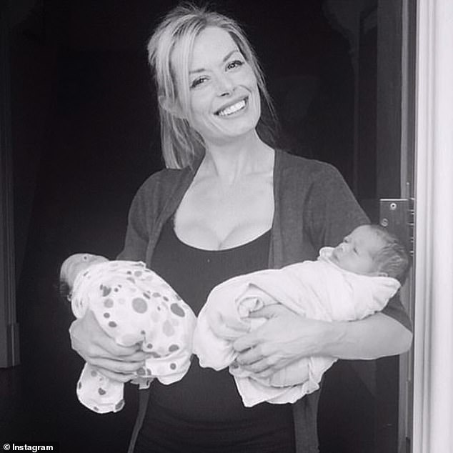 Madeleine West (pictured) posted an image of herself holding two of her children when they were babies along with an ode to motherhood.