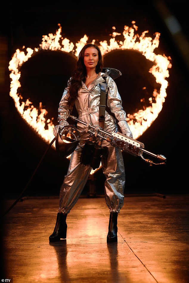 Maya posed up a storm in a metallic boiler suit as she lights up a flamethrower for the dramatic Love Island trailer ahead of the 11th series which airs on ITV on Saturday night.