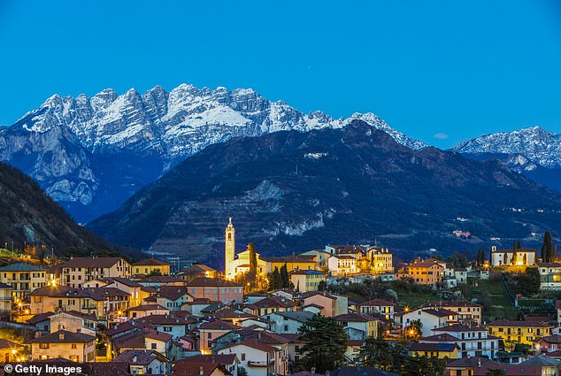 The city of Lecco in northern Italy. Ann Pizzorusso has analyzed the background of the painting and believes it could have been painted in the picturesque town of Lecco, located on the shores of Lake Como.