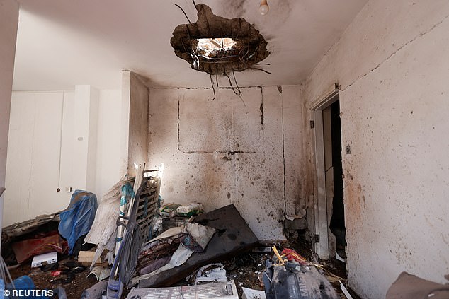 View of the damage suffered in an apartment after the impact of an Israeli rocket launched from the Gaza Strip