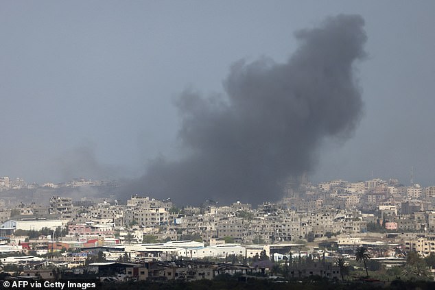 Smoke rises during the Israeli bombardment of the Gaza Strip from a position in southern Israel on May 12, 2024.