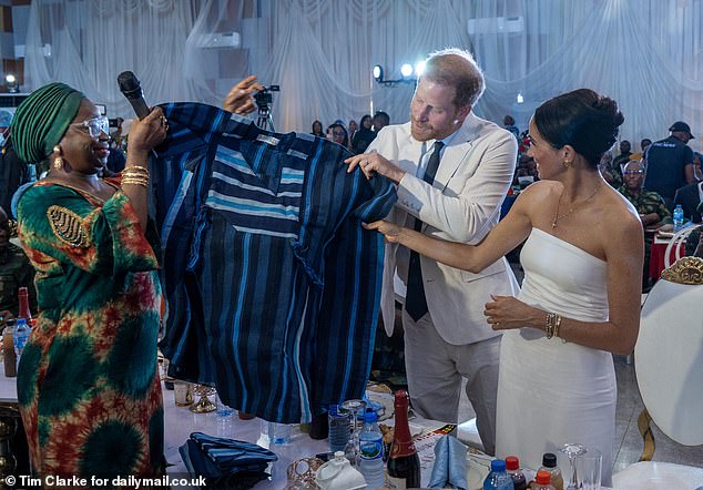 The skirt was a gift from Abike Dabiri Erewa, chairman of the Nigerian Diaspora Commission, who presented the Duke and Duchess with traditional his-and-hers aso oke outfits at a reception at the Nigerian Defense Headquarters.