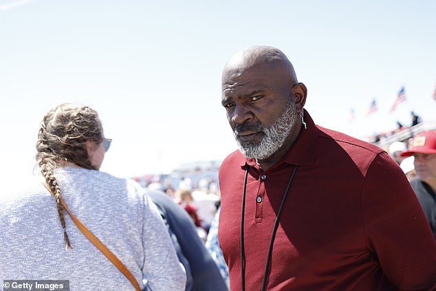 Former NFL football player Lawrence Taylor arrives at a campaign rally for Republican presidential candidate Donald Trump in Wildwood Beach on Saturday.