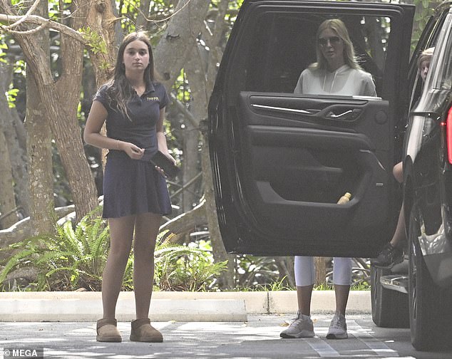 Getting out of the car in Miami, Ivanka's daughter Arabella, 12, was wearing a polo shirt, a pleated skirt and mini boots.