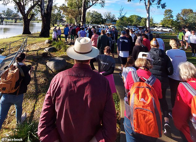 The walk (pictured) was attended by members of Ms Ticehurst's family and Forbes Mayor Phyllis Miller tearfully described the late child care worker's legacy in the small town.