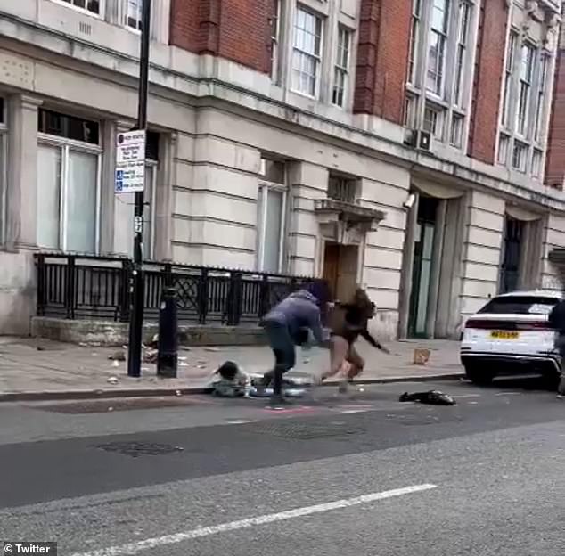 Grim footage has emerged of the two thugs brazenly punching and kicking the couple on Eversholt Street in north London before apparently fleeing with some of their belongings. Each man attacks a victim during the robbery while shocked bystanders watch and cars drive down the capital's busy street.