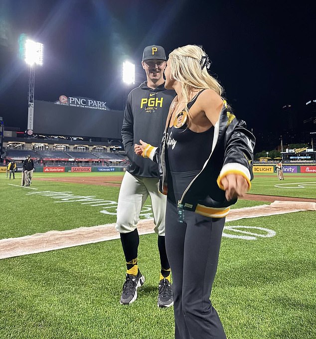 Dunne, a gymnast, shared photos of her and her boyfriend celebrating on the field at PNC Park.