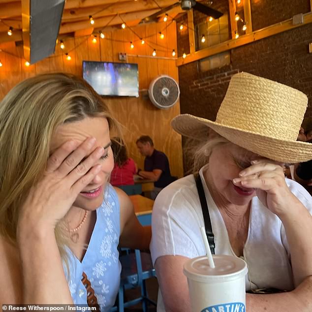 Among the mother-daughter photos, several show Witherspoon and her lookalike mom having a good time. Funny image shows Witherspoon and Reese pretending to be embarrassed