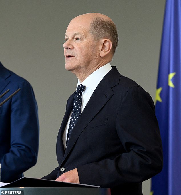 German Chancellor Olaf Scholz (pictured May 8) said Saturday that Ukrainians with a residence and work permit in Germany can stay even as Ukraine seeks to recruit citizens living abroad to serve in the war against Russia.