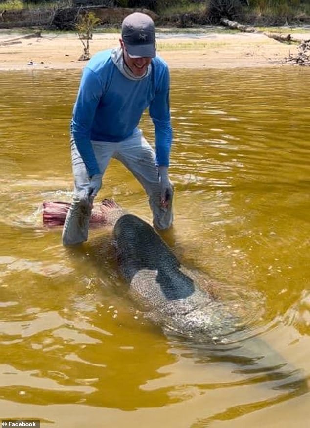 After hauling the huge fish to shore, Weston and Kirkland released it.