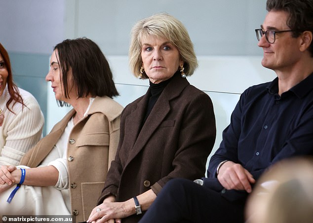 The 'Minister of Fashion', 67, was captured sitting alone in the front row of the Viktoria & Woods show