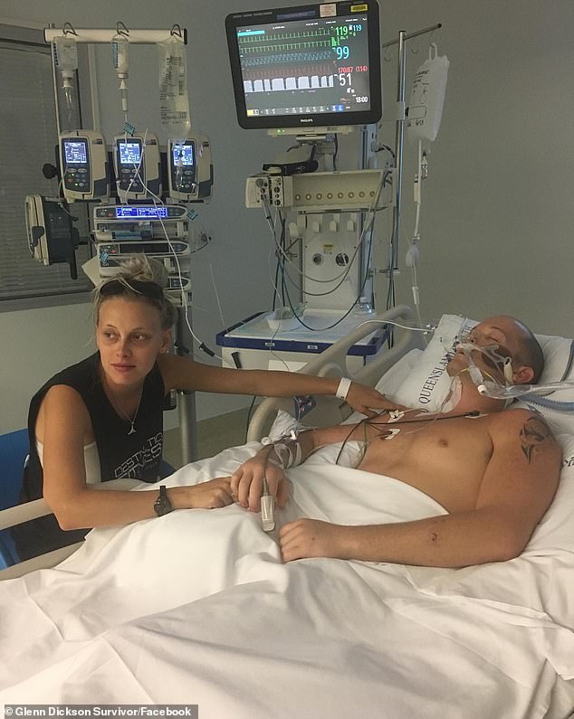 Glenn Dickson and his wife Jessie-lee are pictured recovering in hospital.