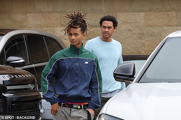 Trey was seen wearing a light blue sweater and gray pants as he arrived at the party alongside Jaden.