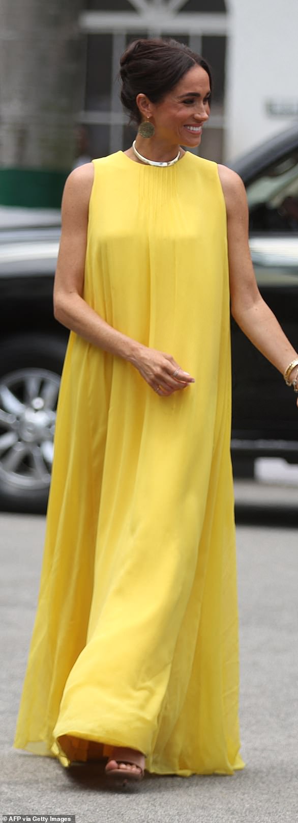 Meghan donned a yellow Caroline Herrera dress on Sunday, which she previously wore to Archie's first birthday.