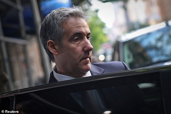 Michael Cohen, former lawyer for Republican presidential candidate and former US President Donald Trump, leaves his Manhattan home to testify in Trump's criminal trial on charges of falsifying business records to hide money paid to silence the porn star Stormy Daniels in 2016, in New York City. , USA, May 13, 2024. REUTERS/Mike Segar