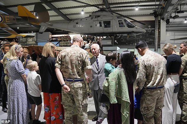 King Charles III meets staff members and their families at the Army Aviation Center today