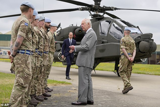 Charles and William at the Army Aviation Center in Middle Wallop, Hampshire, this afternoon