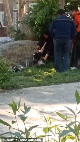 This is the shocking moment an alleged moral police officer attacked a screaming teenager and forced her to the ground.